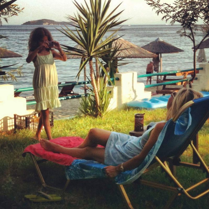 Girl Taking a Photo of her mother at Angeliki Beach Hotel